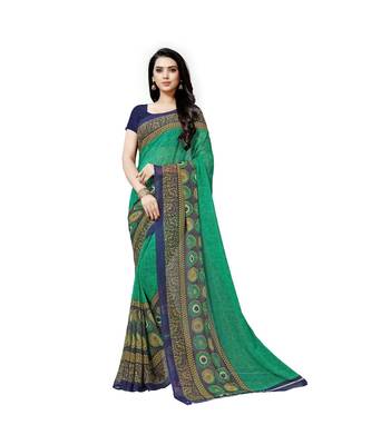 Green printed georgette saree with blouse 1