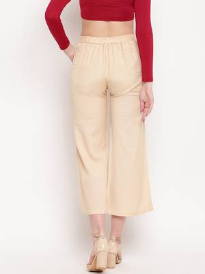 Cream plain viscose trousers 3