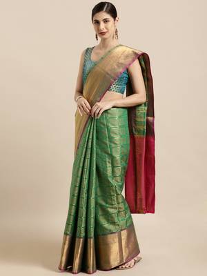 Green woven silk blend saree with blouse 1