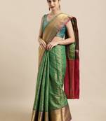 Green woven silk blend saree with blouse