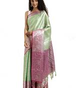 Green woven silk blend saree with blouse