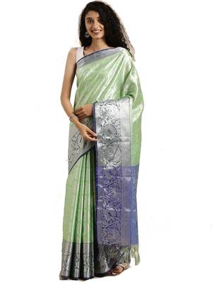 Green woven silk blend saree with blouse 1
