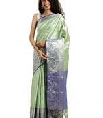 Green woven silk blend saree with blouse