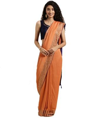 Peach woven silk blend saree with blouse 1