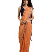 Peach woven silk blend saree with blouse