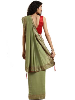 Green woven silk blend saree with blouse 2