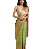 Green woven silk blend saree with blouse