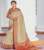 Beige woven jacquard saree with blouse