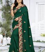 Green embroidered silk saree with blouse