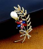 Gold pearl brooch