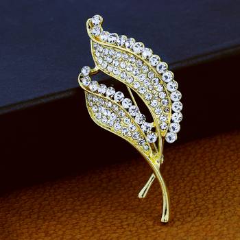 Gold cubic zirconia brooch 1