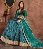 Turquoise Embroidered Silk Semi Stitched Lehenga