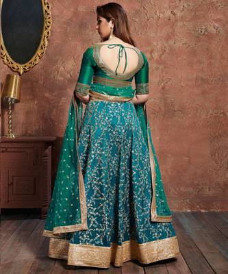 turquoise embroidered silk lehenga 5