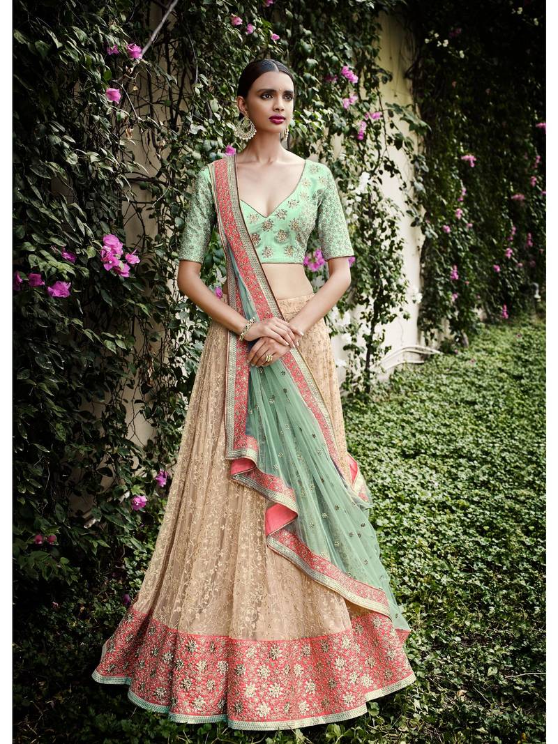 Beige Embroidered Net Semi Stitched Lehenga