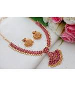 Gorgeous Gold Tone Necklace made out from Ruby Stones with Matching Jhumkas
