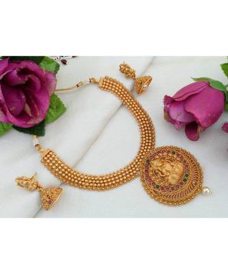 Traditional Matt Gold Finish Necklace with Lakshmi Pendant made out from Ruby Emerald Stones and Matching Jhumkas 1