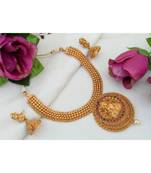 Traditional Matt Gold Finish Necklace with Lakshmi Pendant made out from Ruby Emerald Stones and Matching Jhumkas