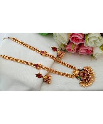 Traditional Antique Gold Finish Long Haar with Kemp Stone Lakshmi Pendant and Matching Jhumkas 1