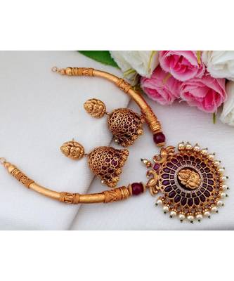 Gorgeous Matt Gold Finish Trunk Design Necklace with Real Kemp Stone Lakshmi Pendant  and Matching Jhumkas 1