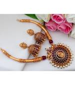 Gorgeous Matt Gold Finish Trunk Design Necklace with Real Kemp Stone Lakshmi Pendant  and Matching Jhumkas