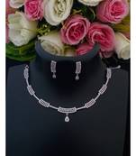 Delicate Party Wear Platinum Finish American Diamond Necklace with Matching Ear Rings