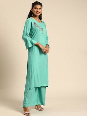 Women Turquoise Blue Solid Kurta With Plazzo With Hand Work Detailing 4