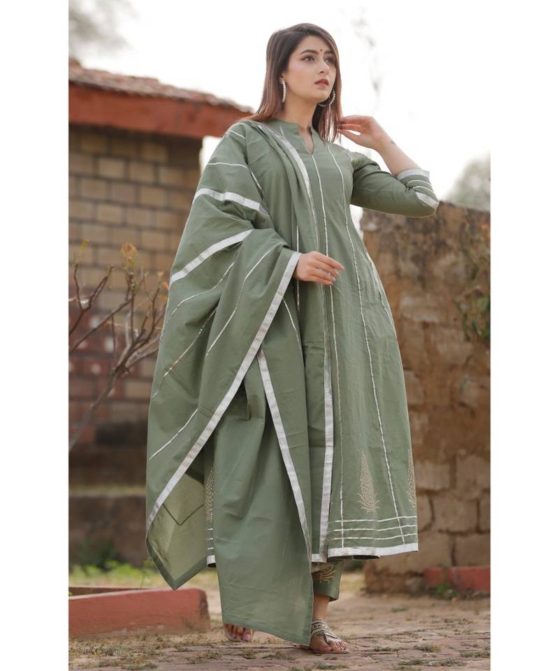 Olive Green anarkali kurta set with dupatta and delited with gota work .