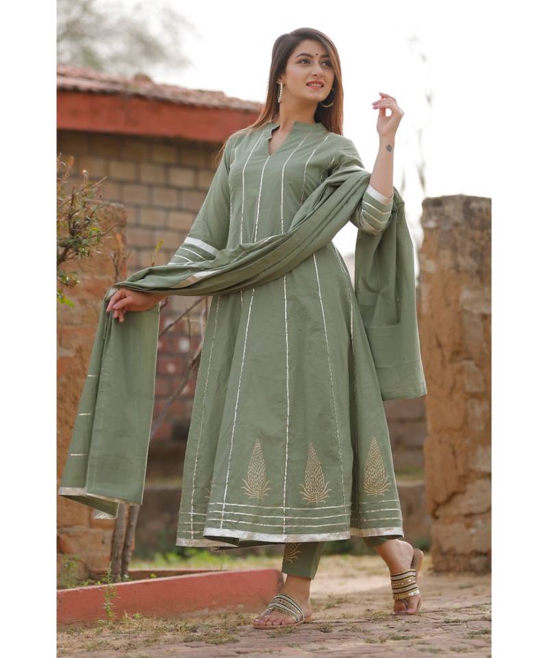 Olive Green anarkali kurta set with dupatta and delited with gota work .