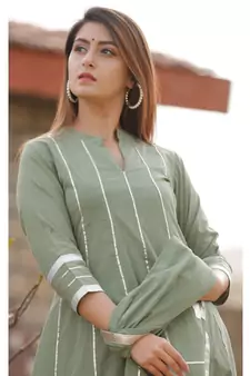 Olive Green anarkali kurta set with dupatta and delited with gota work .
