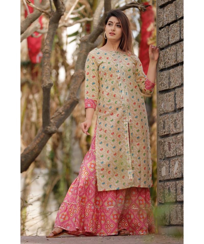 White Floral Printed Sharara Set And Delited With Gota Work .