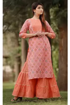 Pink Peach Floral Printed with Sharara Set and Delited With Gota Work .