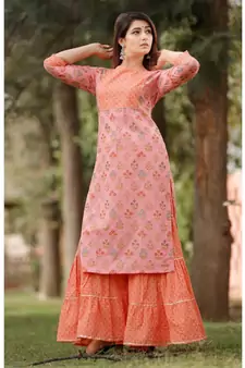 Pink Peach Floral Printed with Sharara Set and Delited With Gota Work .