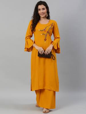 Blissta Women Mustard Solid Kurta with Plazzo With Hand Work Detailing 1