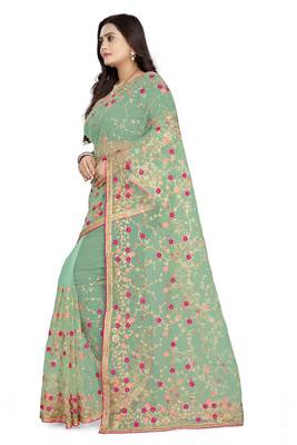 Light parrot green embroidered net saree  2