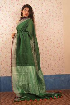 Bottle Green Linen saree with blouse with Zari Border