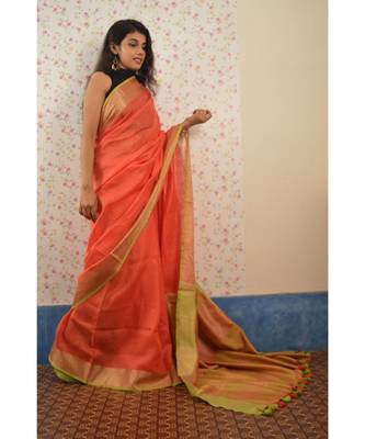 Orange Linen saree with blouse with zari border 1