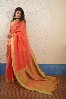 Orange Linen saree with blouse with zari border