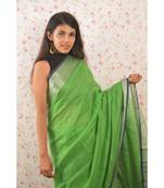 Green Linen saree with blouse with zari border
