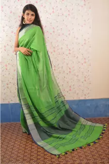 Green Linen saree with blouse with zari border