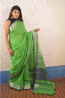 Green Linen saree with blouse with zari border