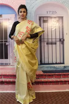 Light  creamish Golden Tissue Linen Embroidered saree with blouse