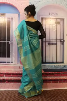 Blue Linen saree with blouse with zari border