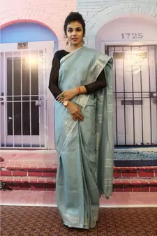Pastel Blue Linen saree with blouse with zari border