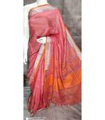 Tomato shade Linen saree with blouse with Zari border