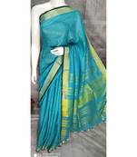 Blue Shade Linen saree with blouse with zari border