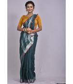 Bottle Green Linen saree with blouse with Zari Border