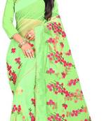 Light green embroidered net saree with blouse