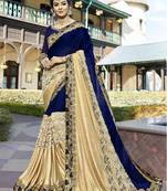 Blue and golden embroidered georgette saree with blouse