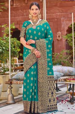 Green woven silk saree with blouse 1