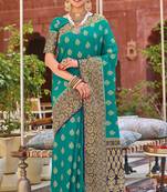 Green woven silk saree with blouse